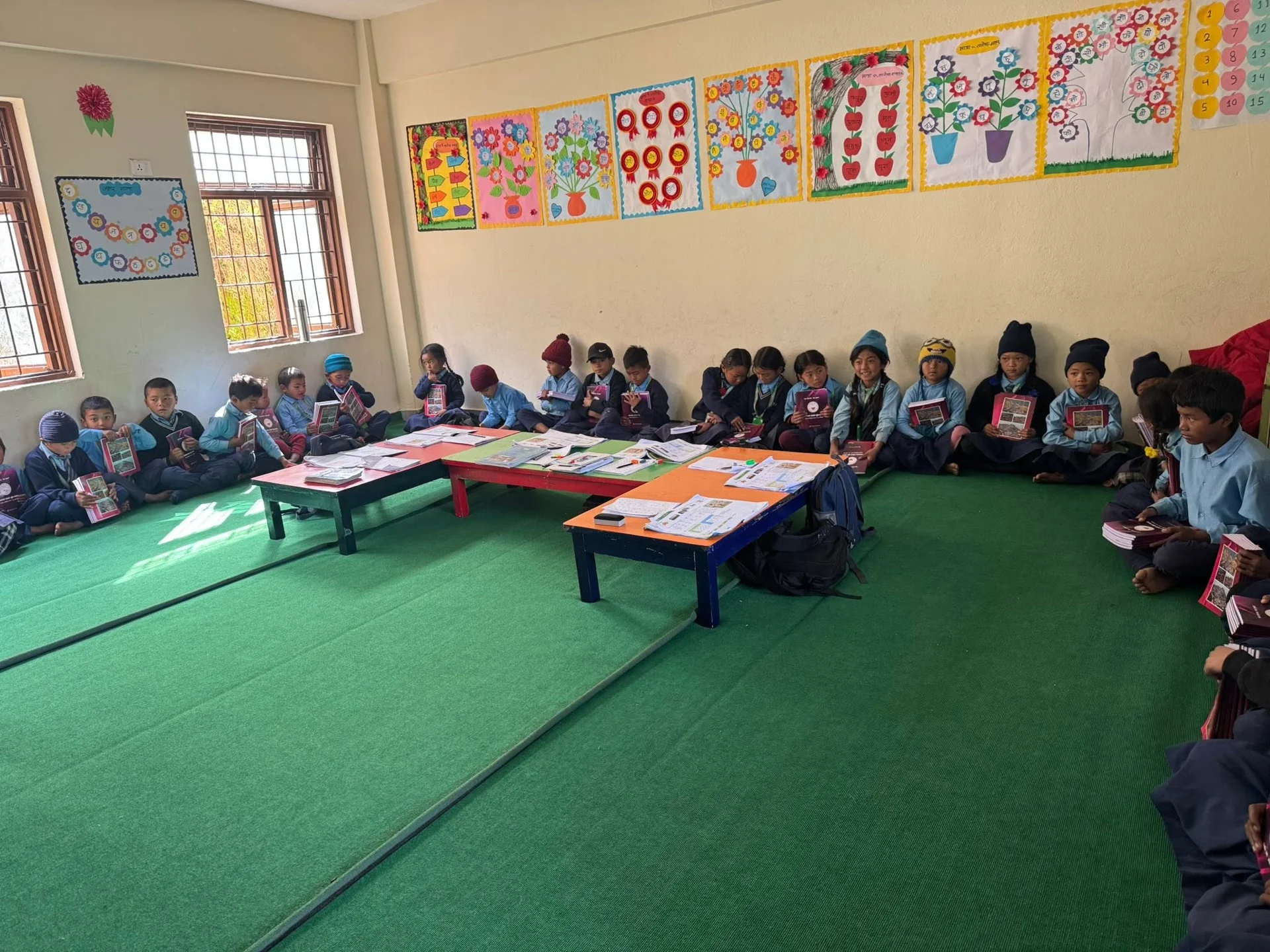 Joyful pre-primary children participating in class